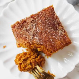 a fork with a bite of pumpkin bar on it