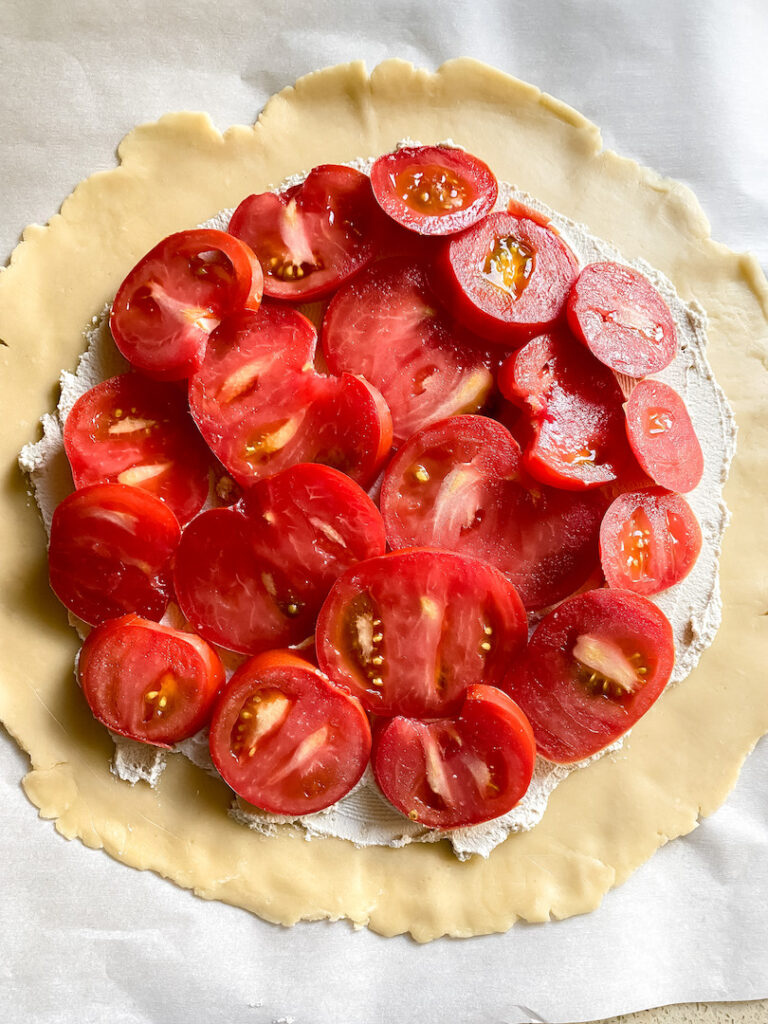 shot of tomato galette being made
