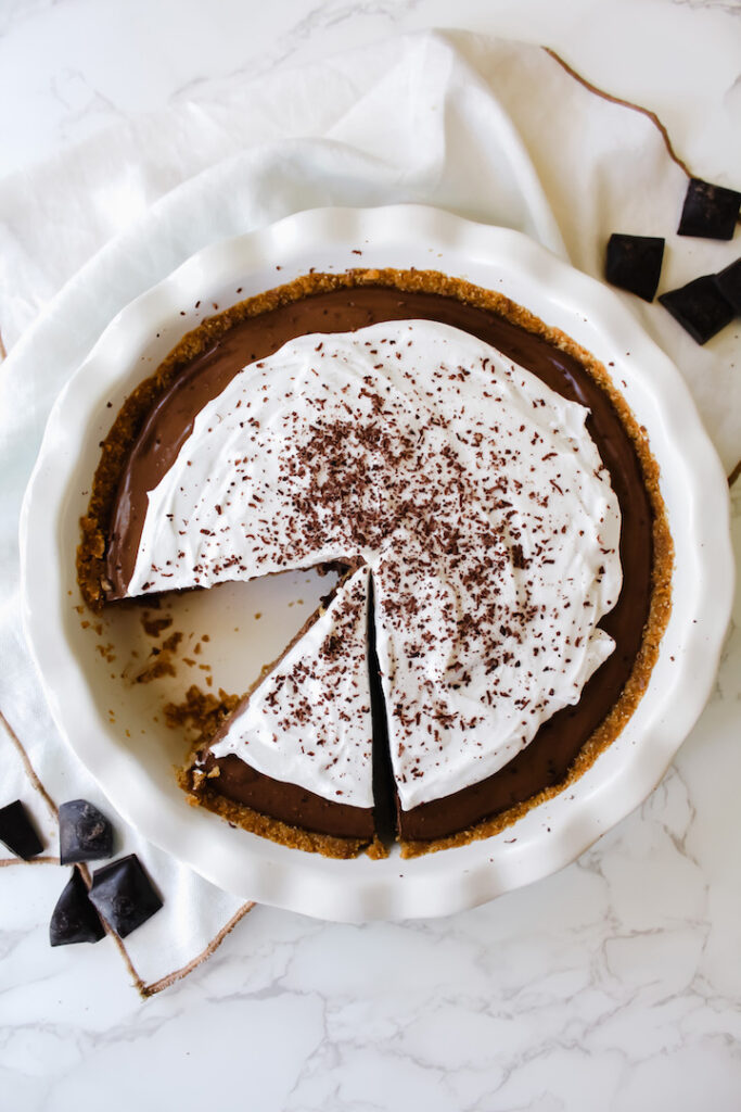 overview shot of the no bake chocolate silk pie with a slice cut