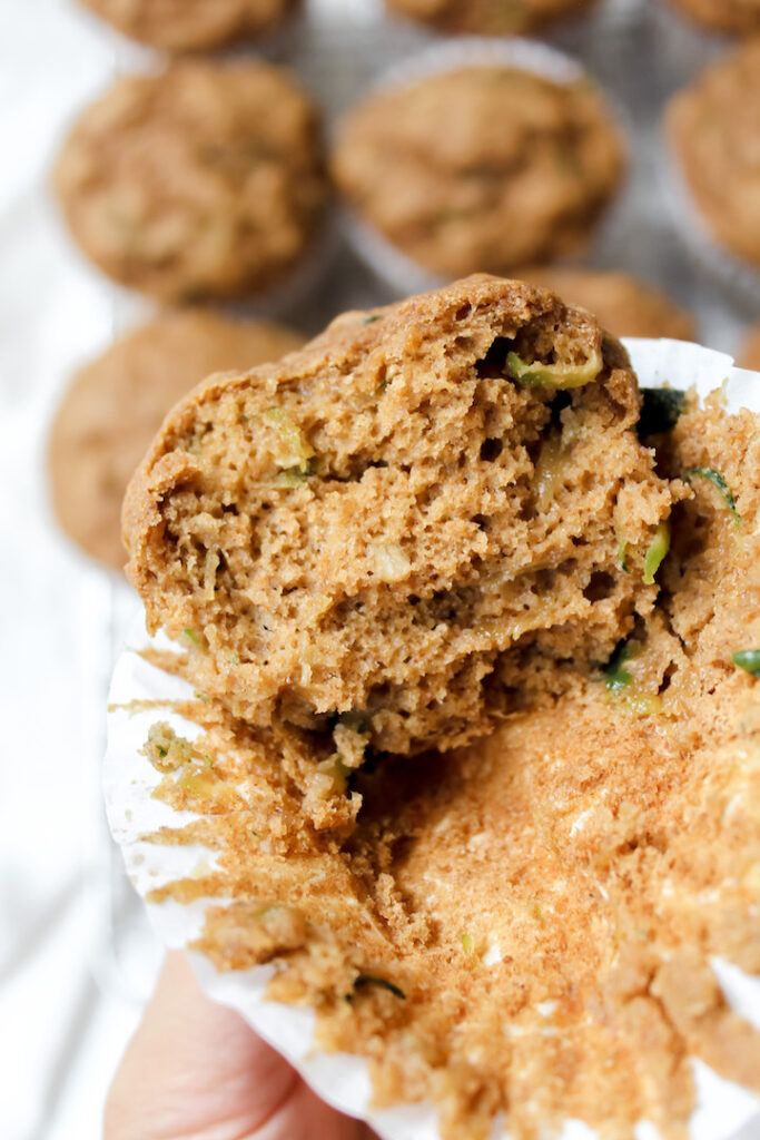 bite shot of zucchini bread muffin