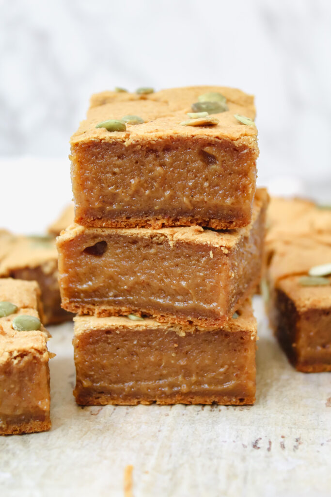 pumpkin mochi bars stacked on top of each other