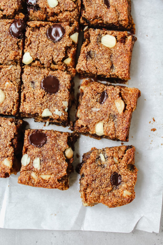 corner shot of the dark chocolate macadamia blondies