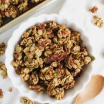 pumpkin granola in a white bowl