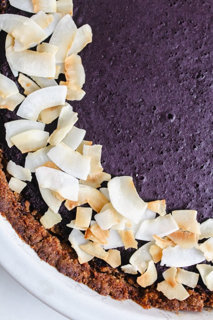 close up of the coconut on top of the ube pie