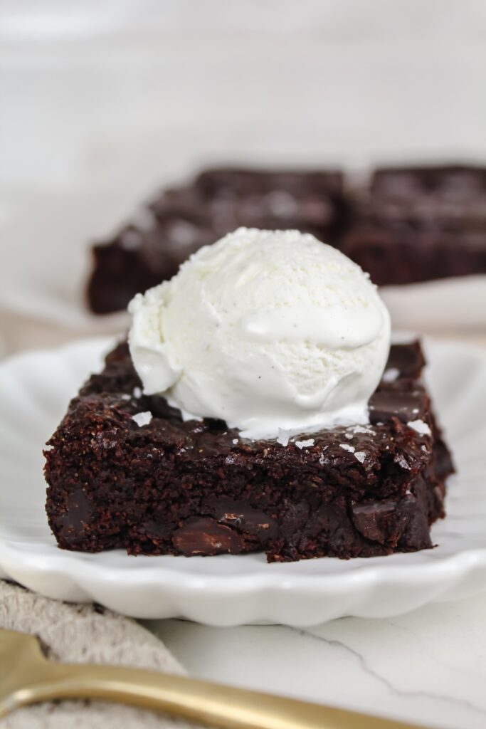 slice of brownie with ice cream on top