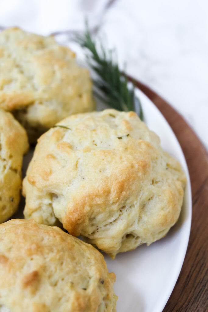 side angle close up shot of a rosemary olive oil drop biscuit