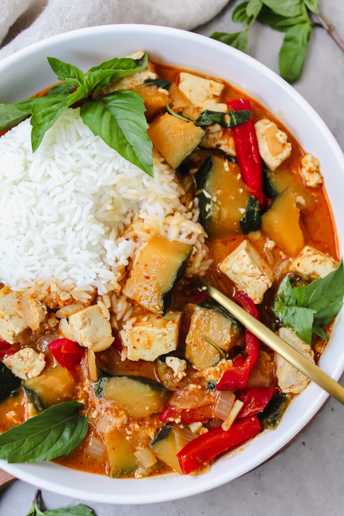 spoon in the thai red curry