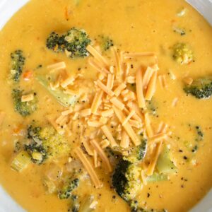 overview shot of bowl of broccoli cheese soup