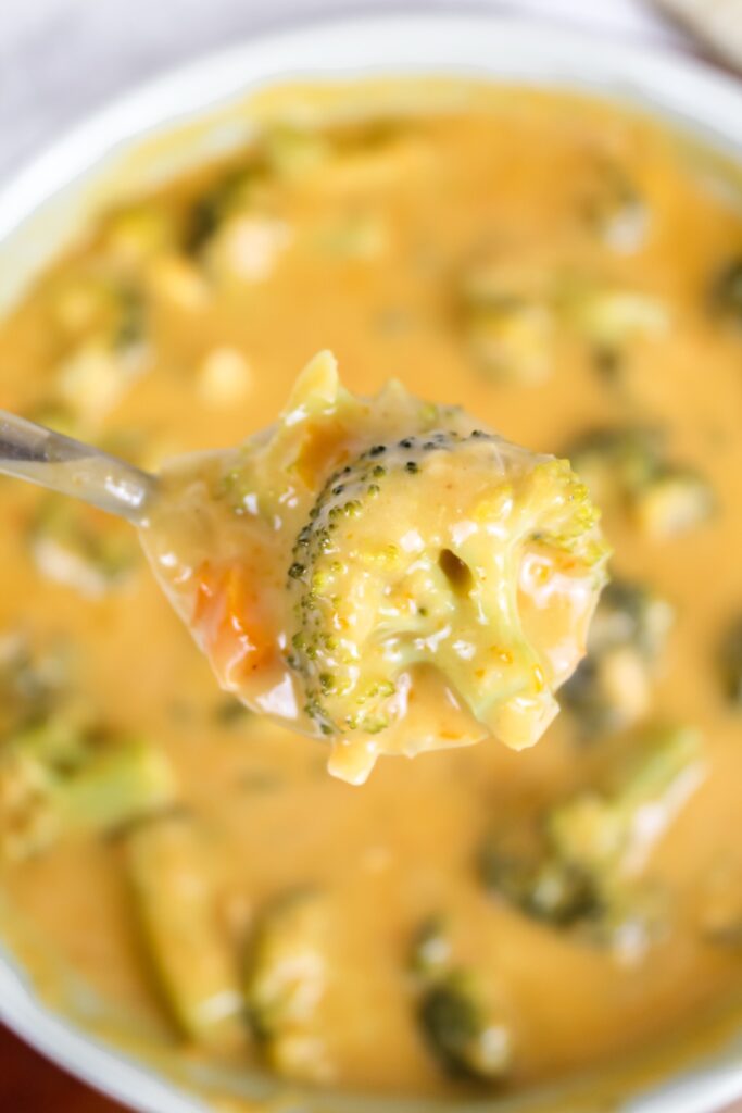 a spoon of vegan broccoli cheese soup