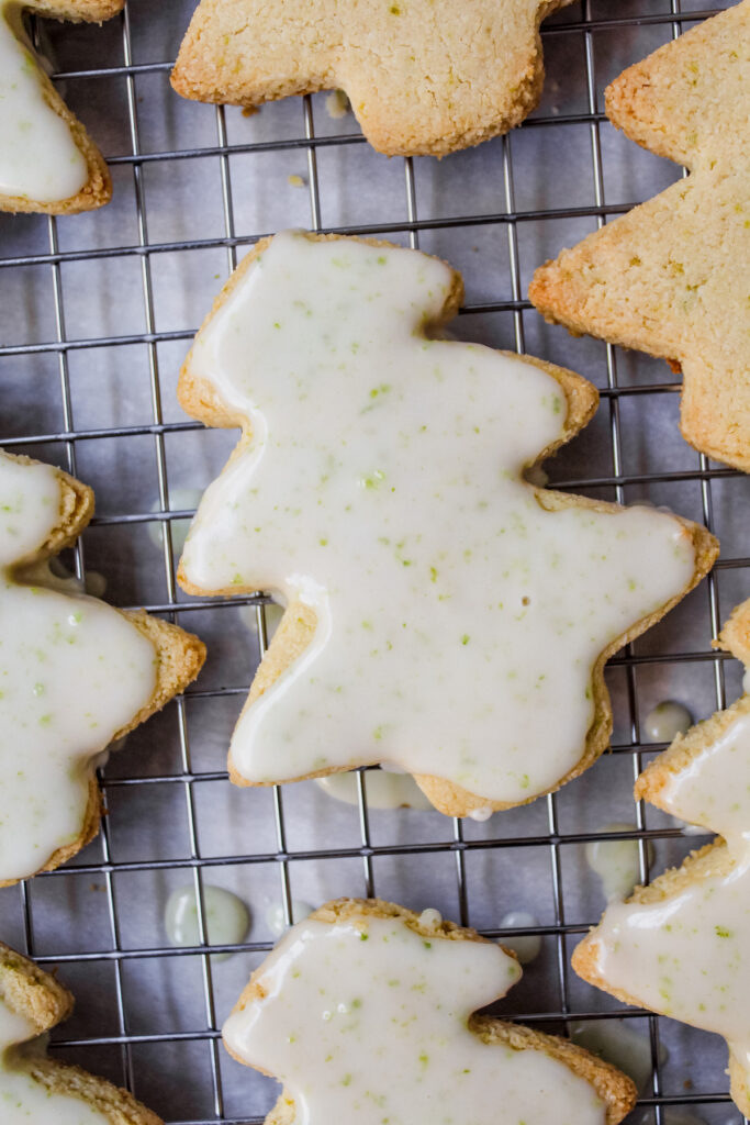 close up of an iced lime shortbread cookie