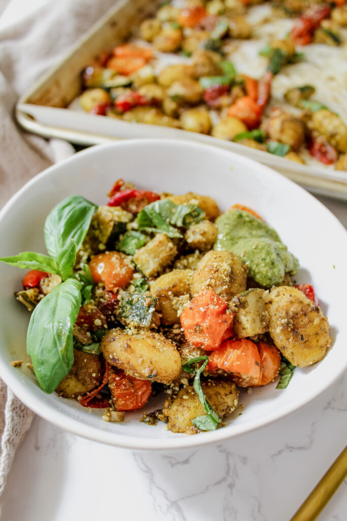 bowl of gnocchi with basil