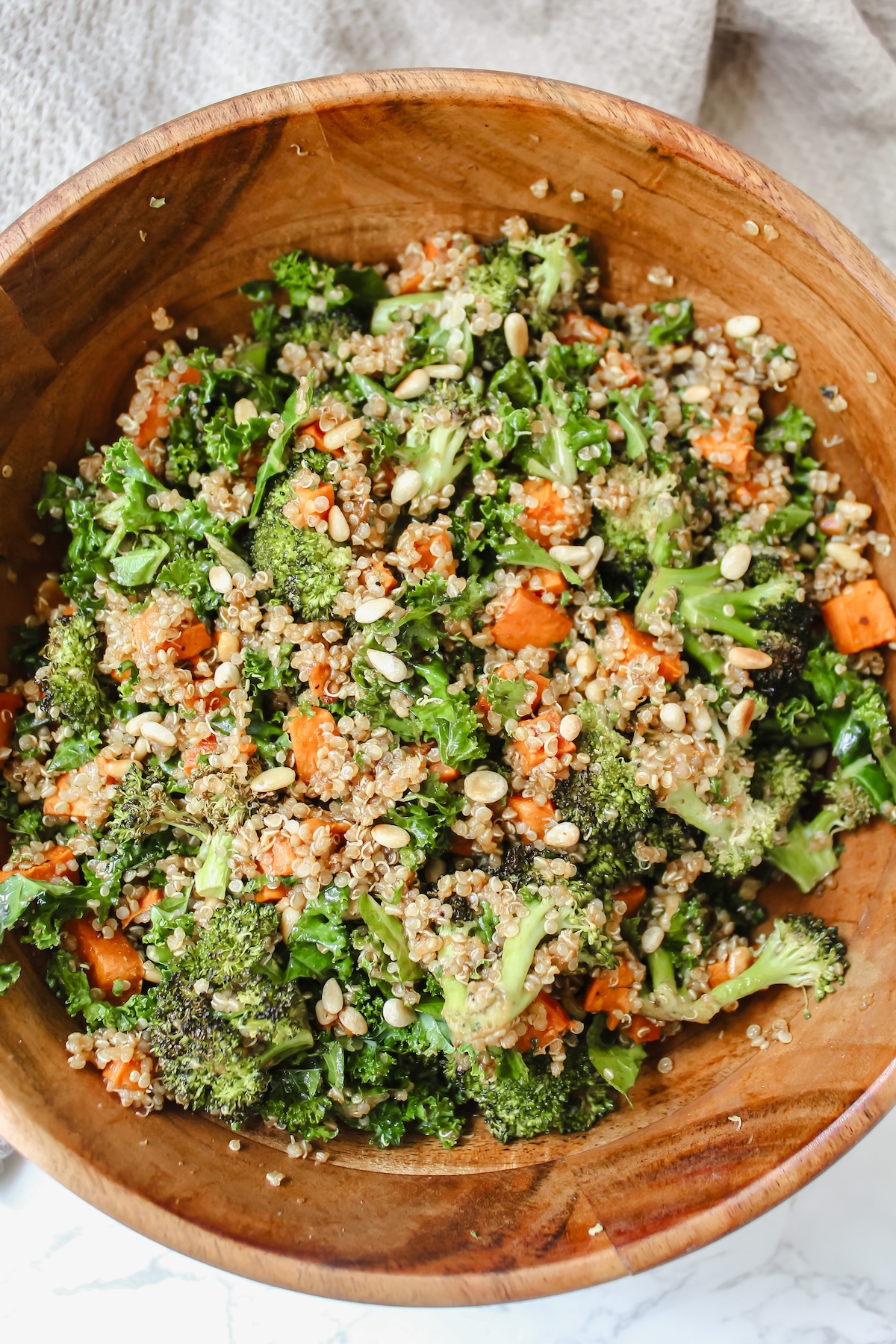 Overview shot of roasted broccoli and sweet potato quinoa salad