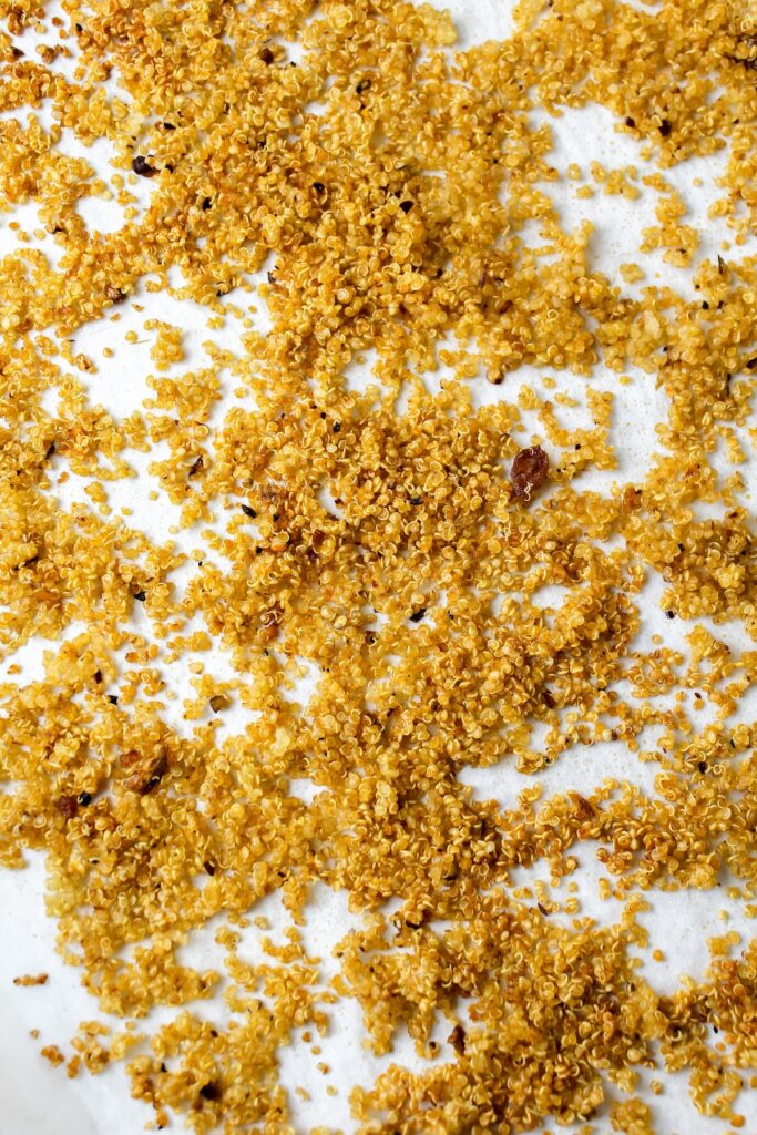 picture of crispy quinoa on a sheet pan