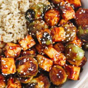 bowl of rice with gochujang brussels sprouts and tofu