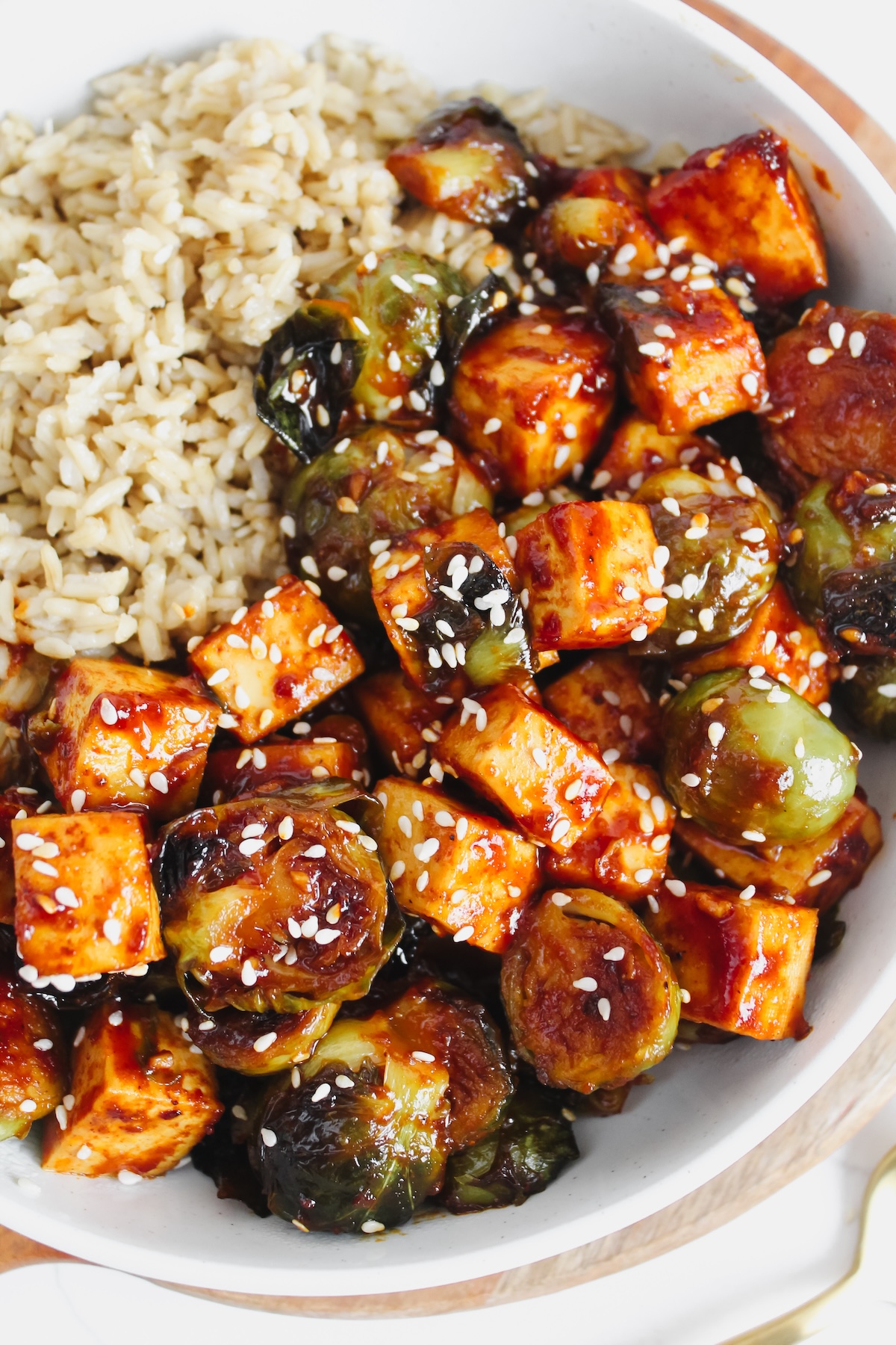 bowl of rice with gochujang brussels sprouts and tofu