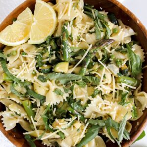 overview shot of lemon basil pasta salad in wooden bowl