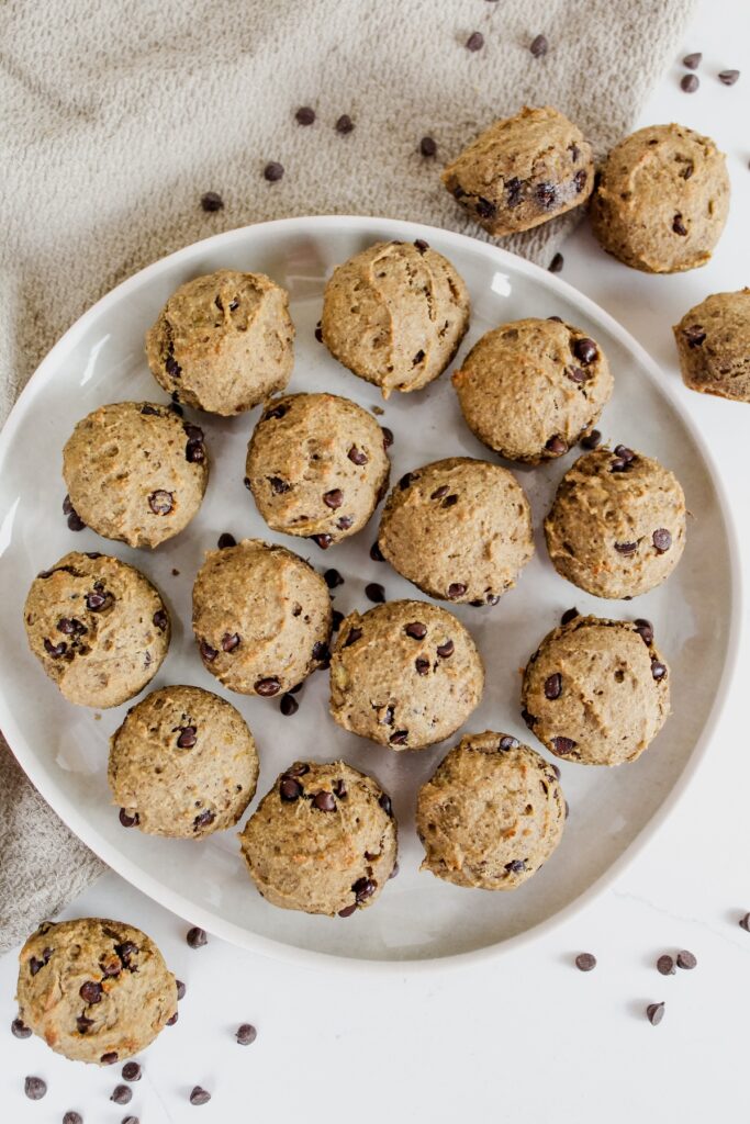 chocolate chip banana protein muffins on a plate