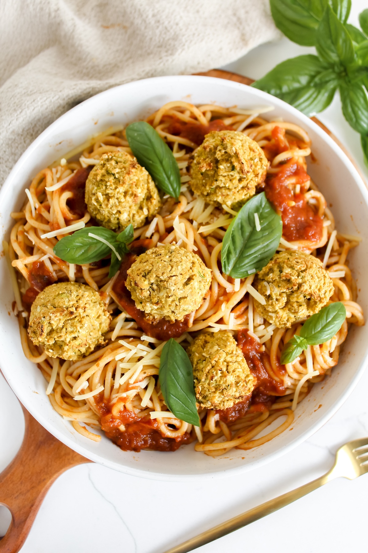 overview shot of entire plate of pasta with zucchini chickpea meatballs