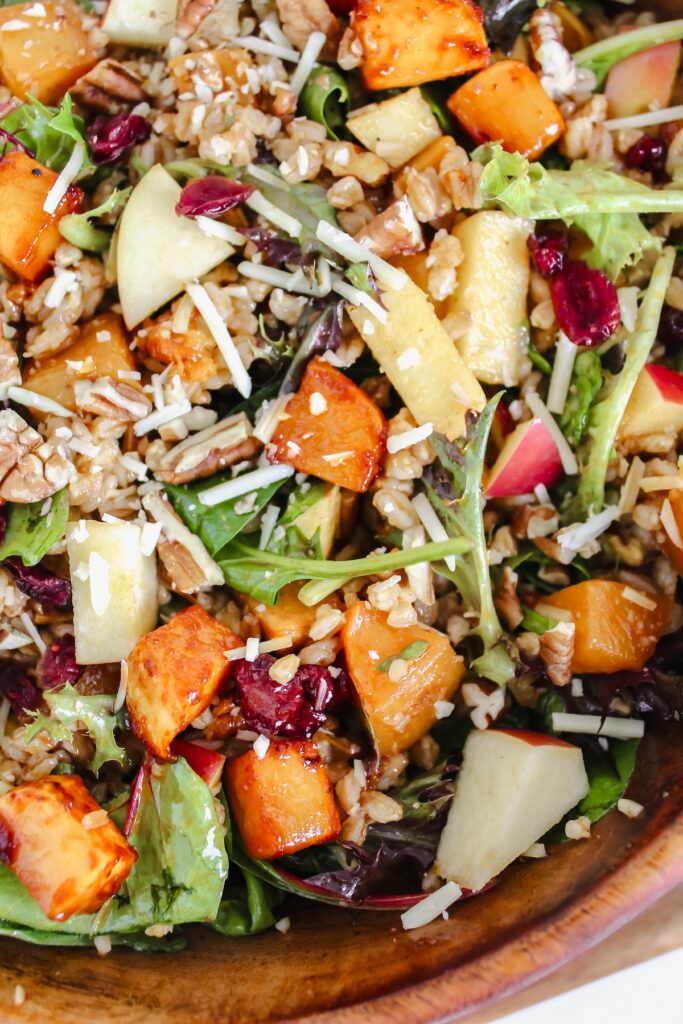 close up of gochujang roasted butternut squash apple farro salad