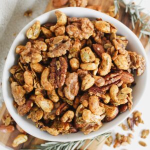 overview shot of rosemary spiced roasted nuts in a bowl