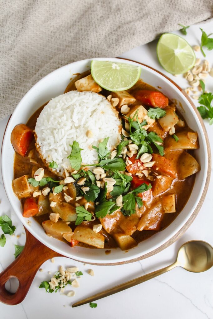 bowl of thai massaman curry and rice