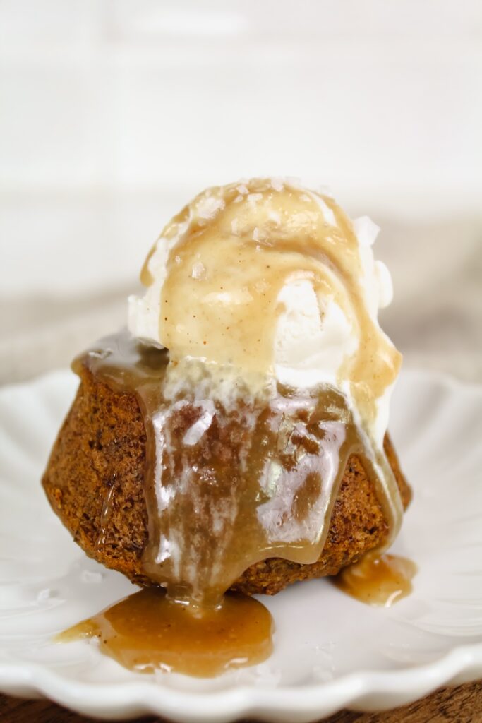 individual sticky toffee pudding with ice cream on top