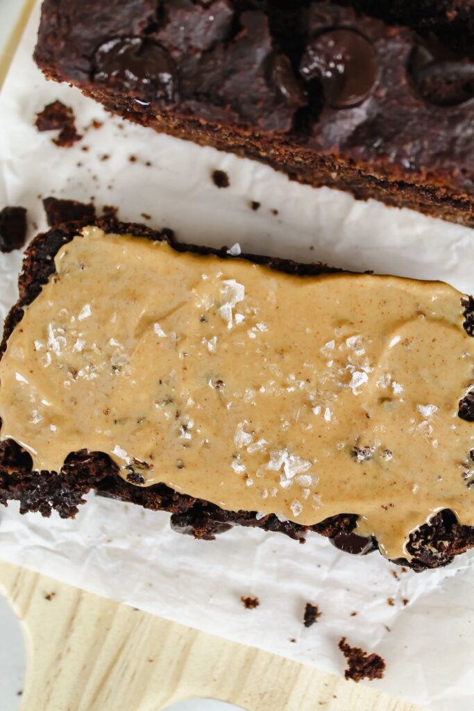 double chocolate protein banana bread with peanut butter on top