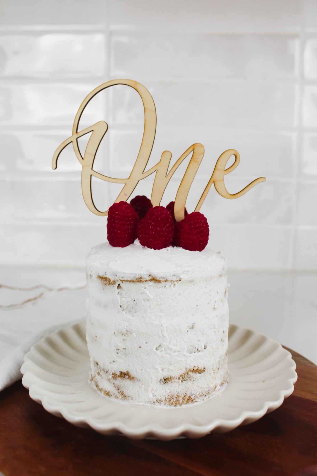 picture of healthy smash cake with raspberries on top