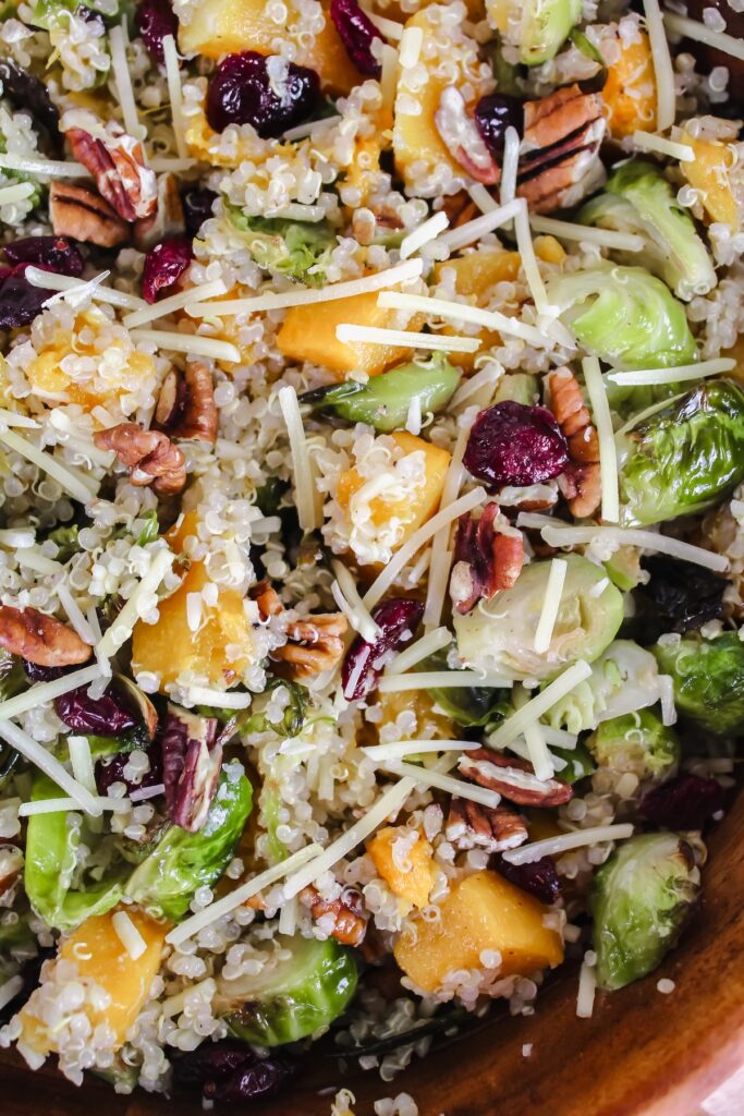 close up shot of salad in wooden bowl
