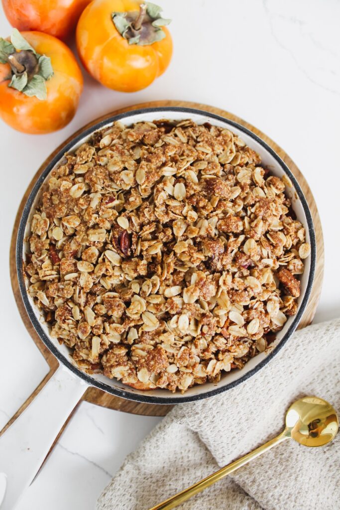 overview shot of skillet with small batch persimmon crisp