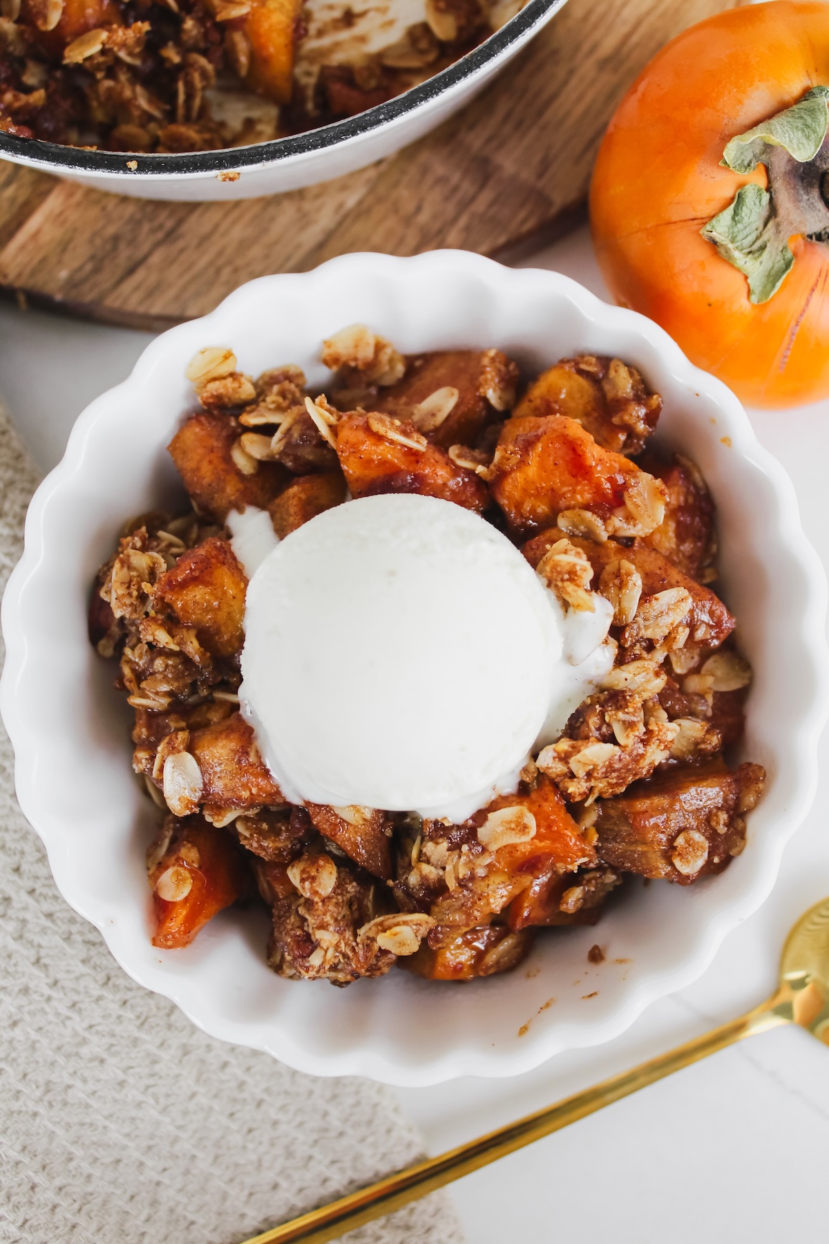 overview shot of bowl of persimmon crisp