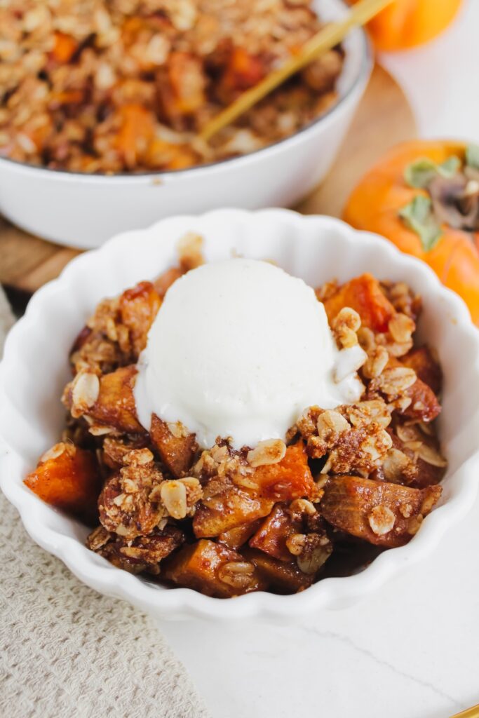 angled shot of crisp with ice cream on top