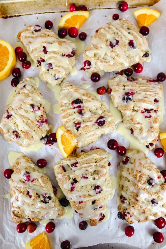 overview shot of a sheet pan with cranberry orange scones