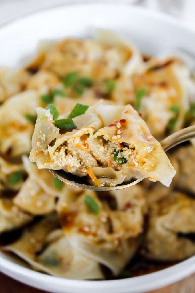 bite shot of a wonton