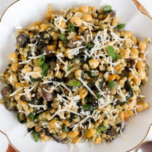 overview shot of one pan creamy miso chickpea mushroom couscous