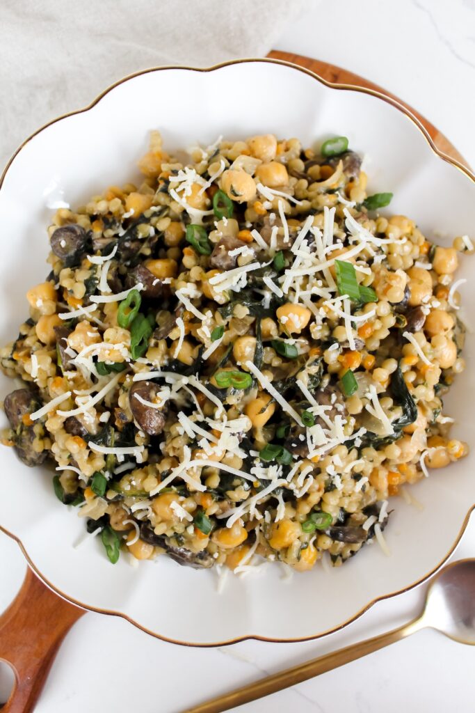 overview shot of one pan creamy miso chickpea mushroom couscous