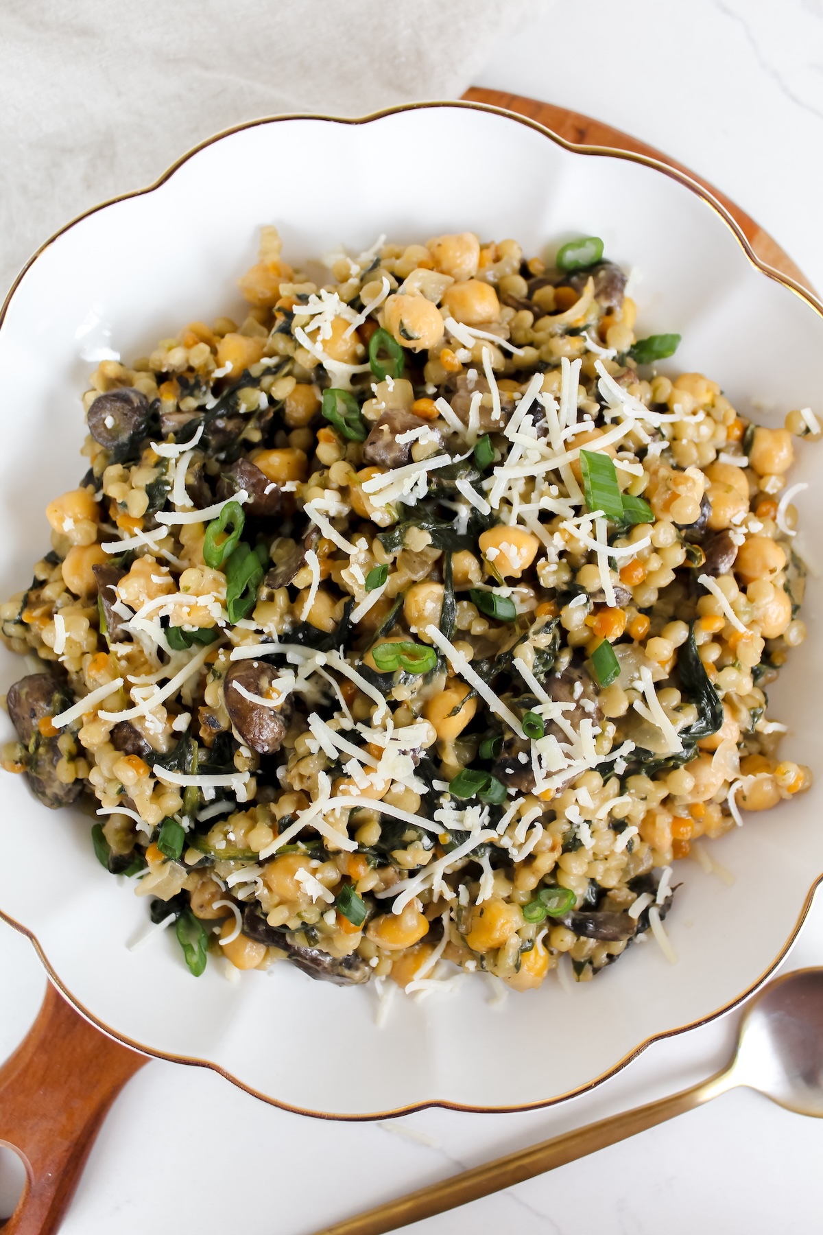 overview shot of one pan creamy miso chickpea mushroom couscous