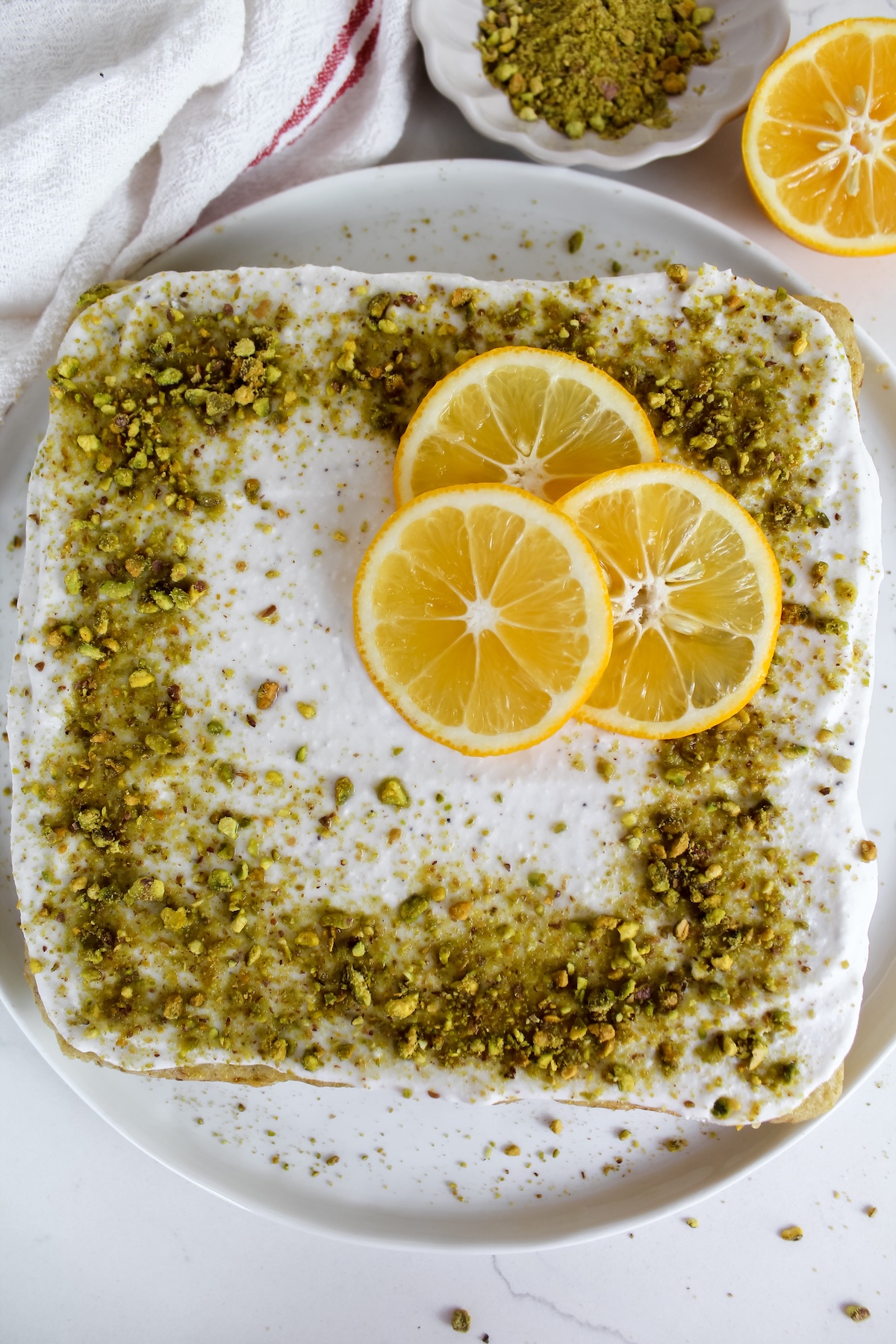 overview shot of entire vegan lemon pistachio olive oil cake