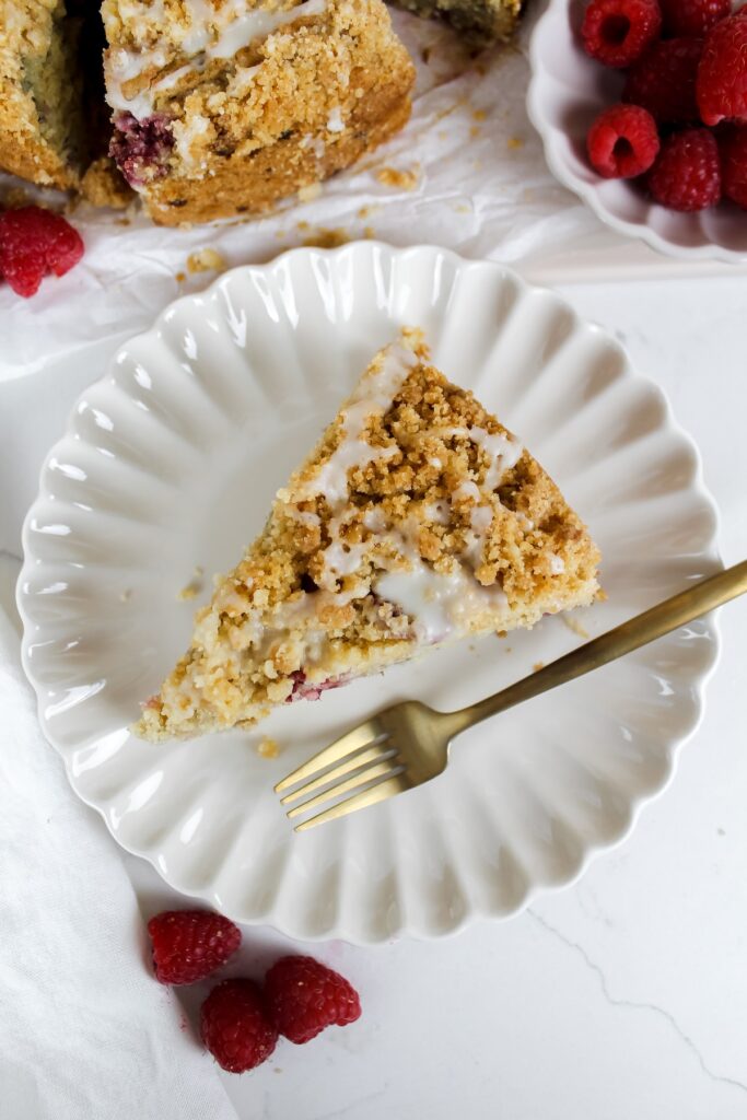 slice of cake on a plate with a fork