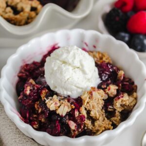 white bowl with berry crisp