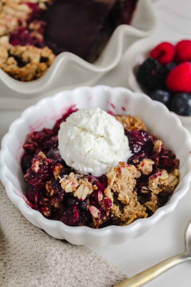 white bowl with berry crisp