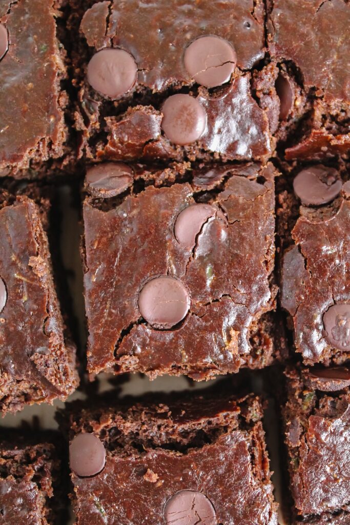 close up shot of sliced chocolate zucchini snack cake