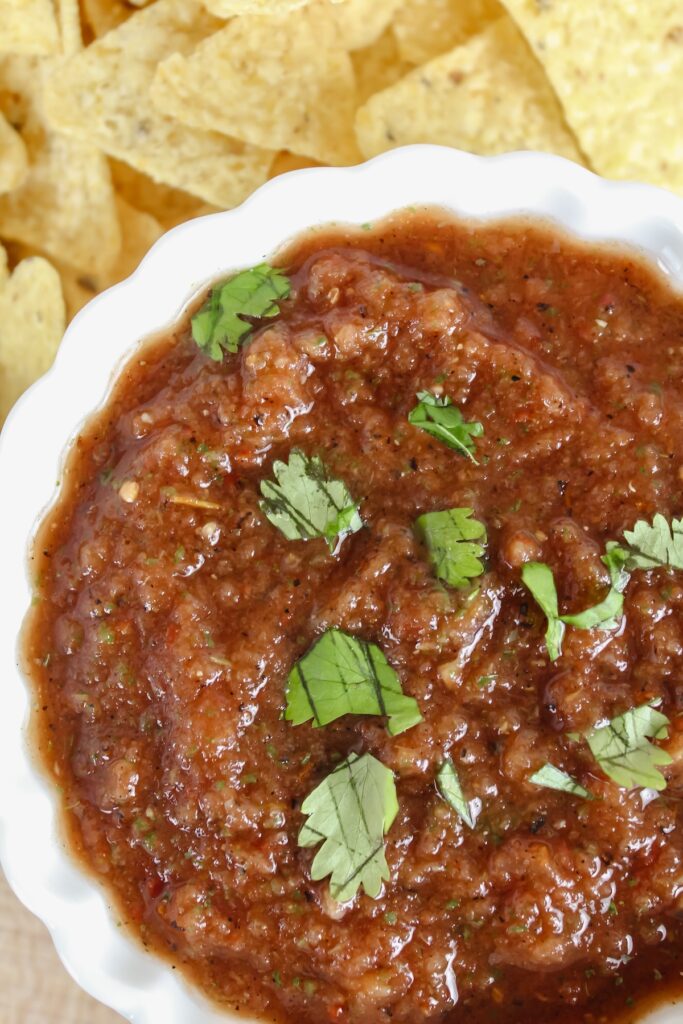 close up shot of salsa in a white bowl