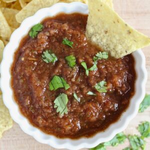 chip in a bowl of salsa