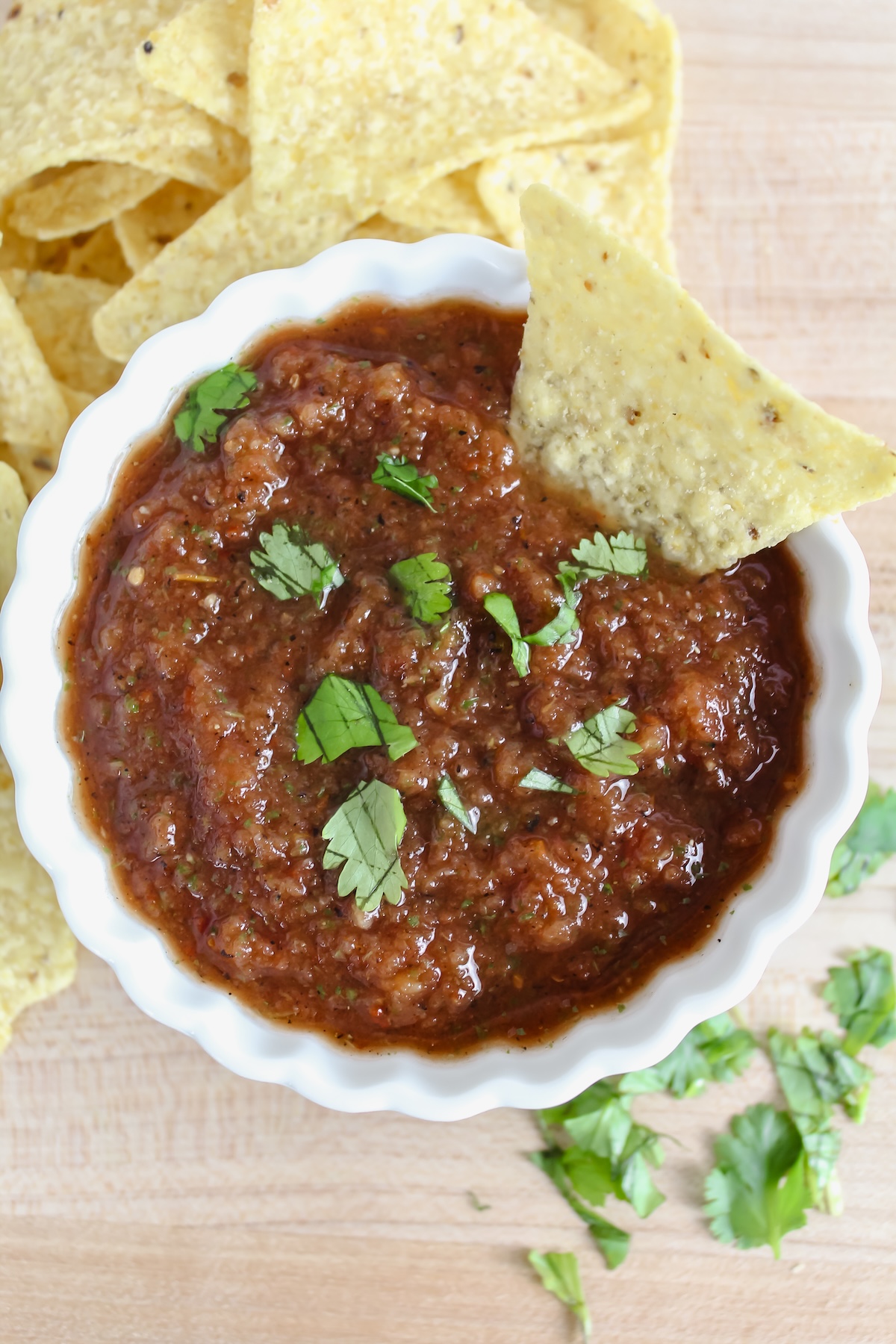 chip in a bowl of salsa