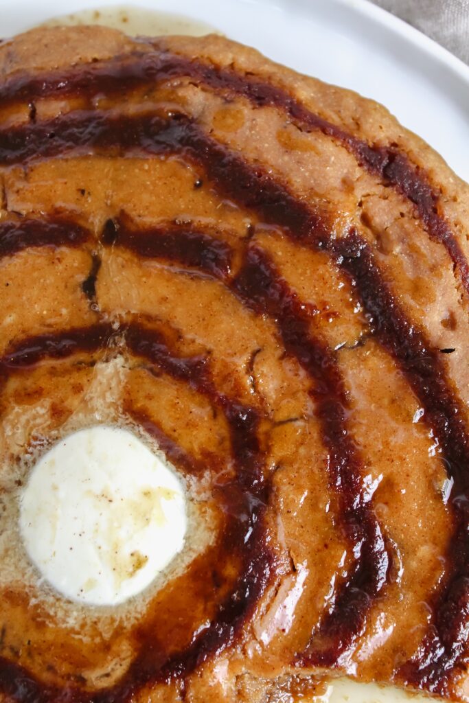 close up of pumpkin cinnamon roll pancake
