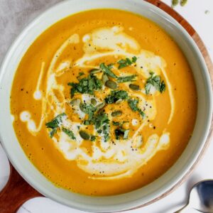 overview shot of bowl of immune boosting carrot ginger soup