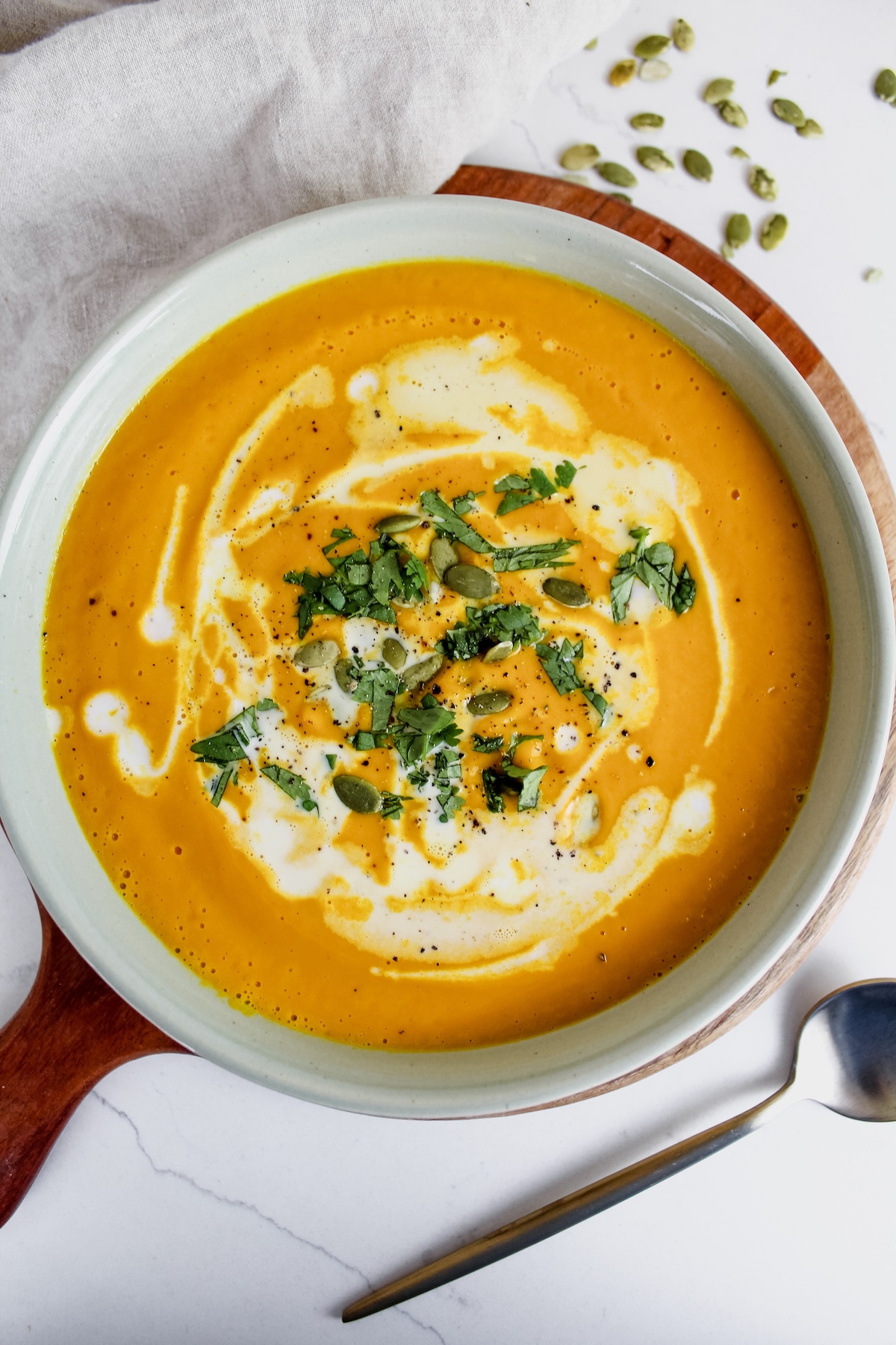 overview shot of bowl of immune boosting carrot ginger soup
